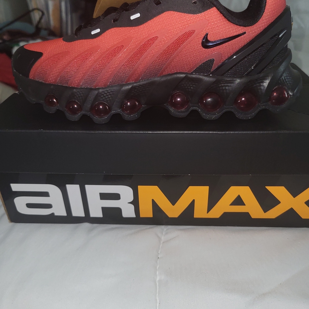 Nike Black and Red Youth Athletic Shoes with Swoosh